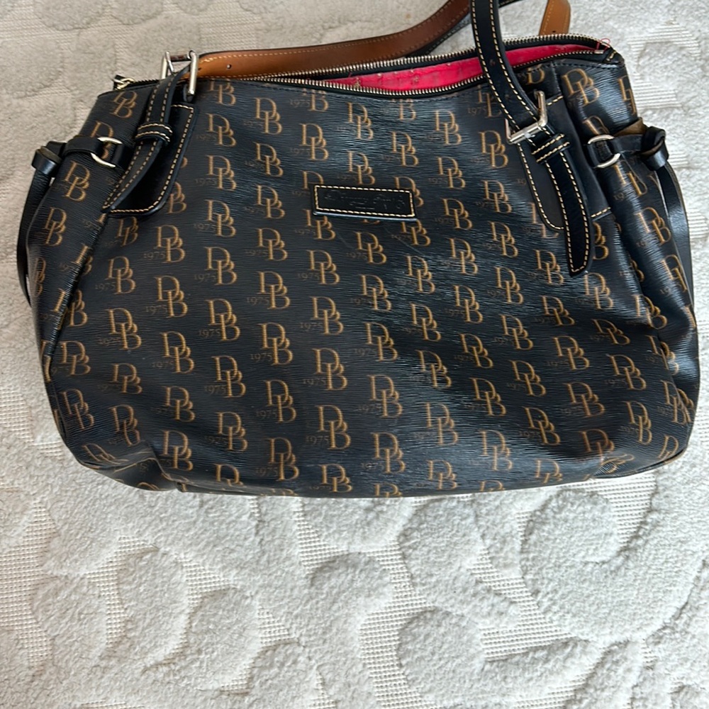 Authentic Dooney and Bourke coated canvas bag with matching coin purse